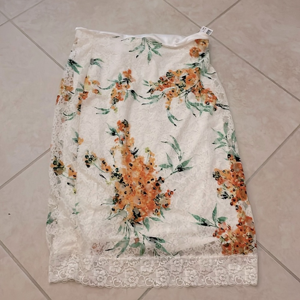 White lace midi-skirt with tropical flower lace.